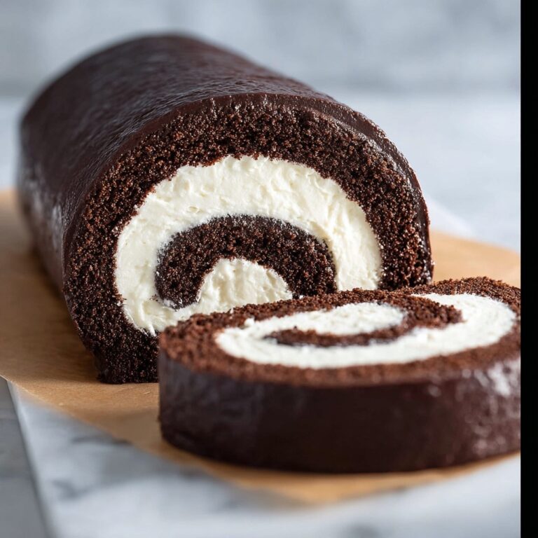 Swiss Chocolate Cake Roll with Marshmallow Buttercream and Dark Chocolate Ganache Recipe